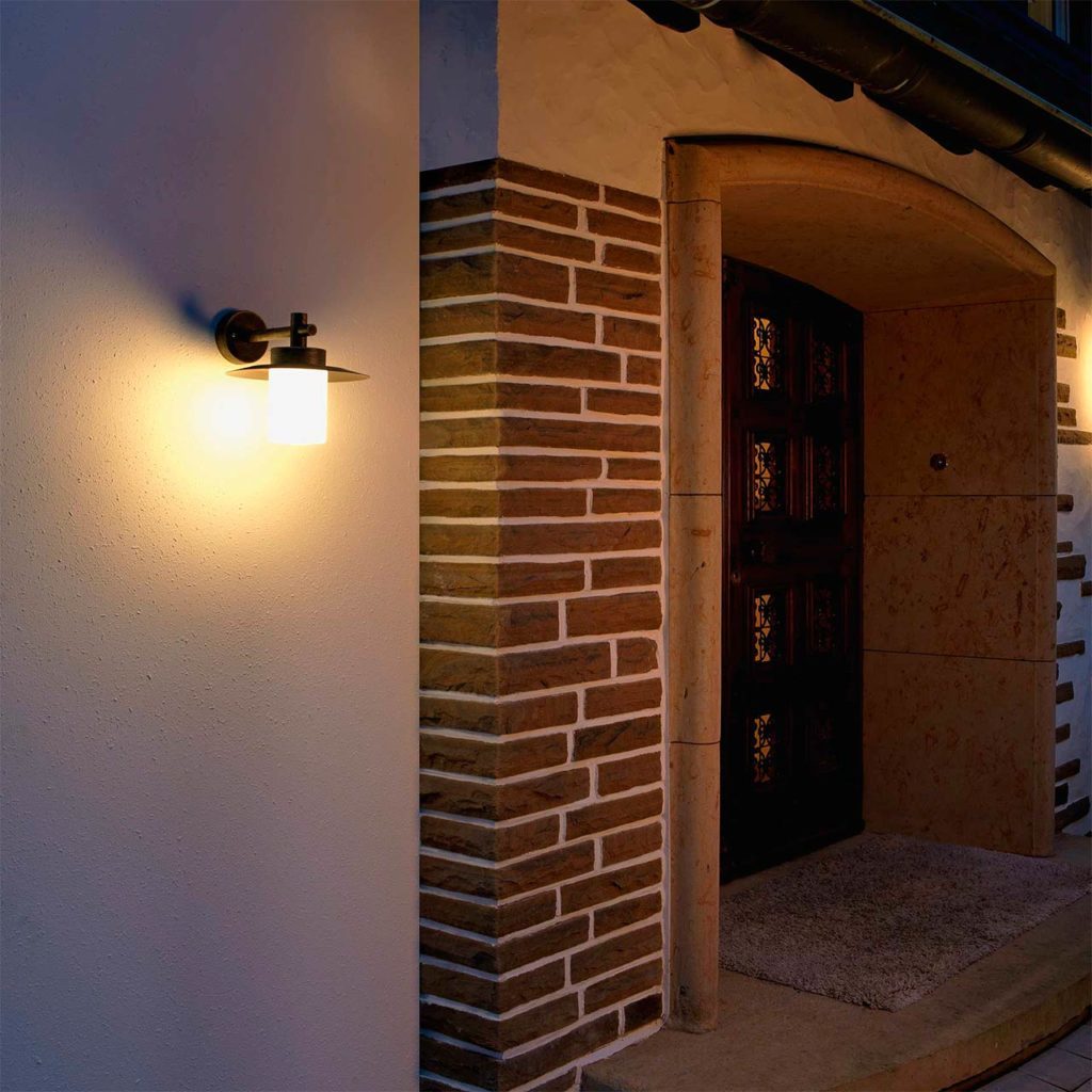 A timeless home entrance light provides light and security at a front door.